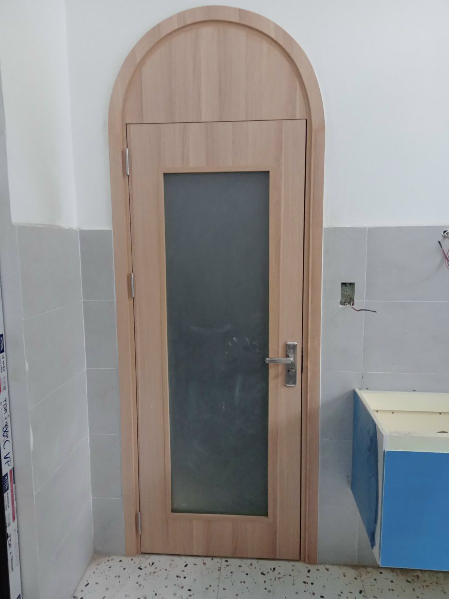 cửa vòm gỗ mdf melamine an cường gắn ô fix cho tường cao 2600
