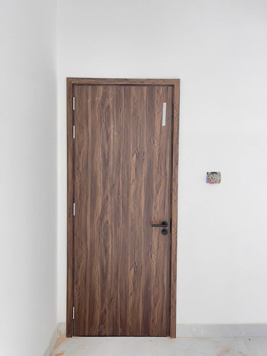 Cửa nhựa gỗ composite chống nước giá rẻ do Nhật Minh Home lắp đặt cho nhà vệ sinh ở Thủ Dầu Một